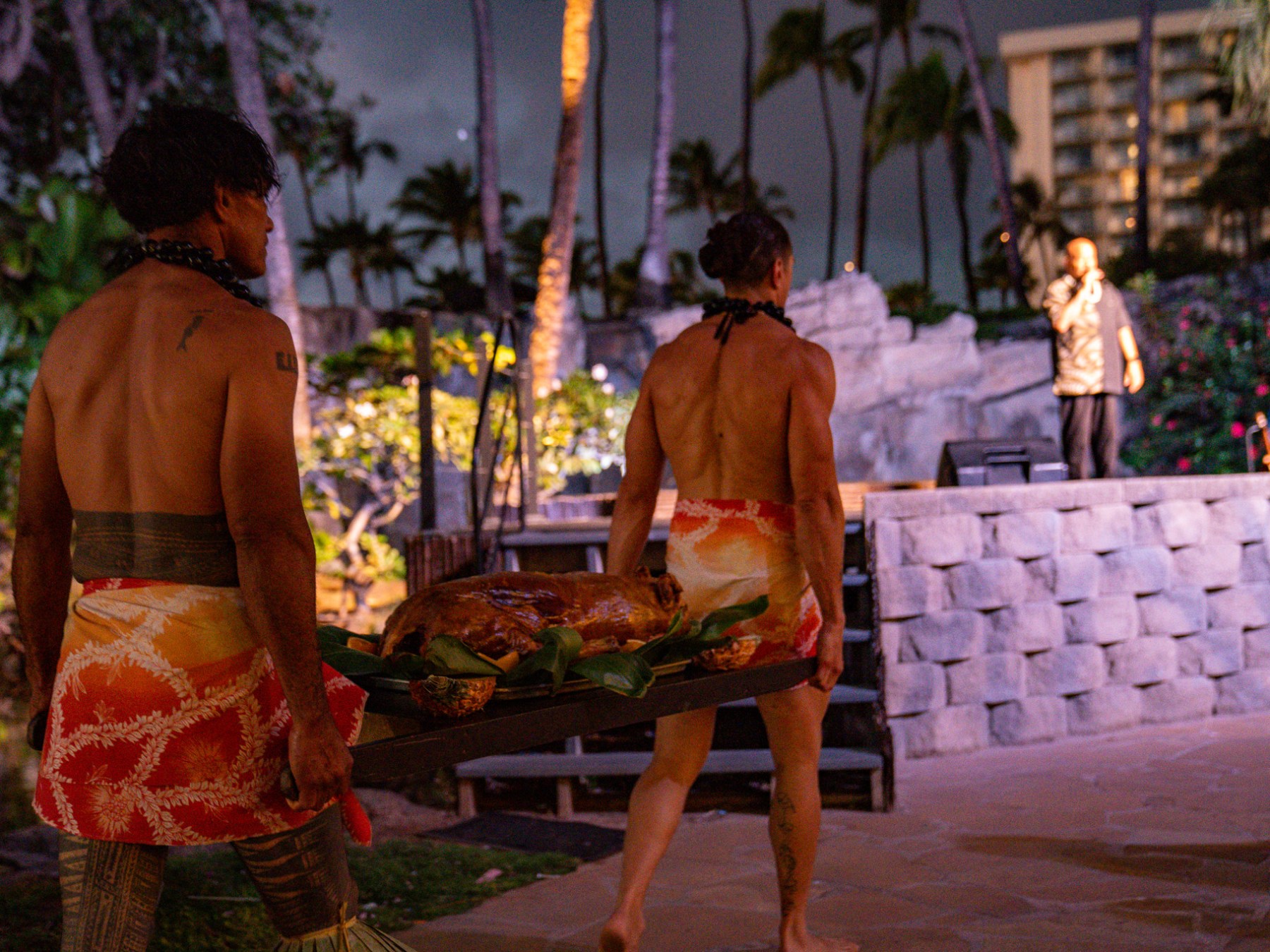 a man and a woman sitting on a bench